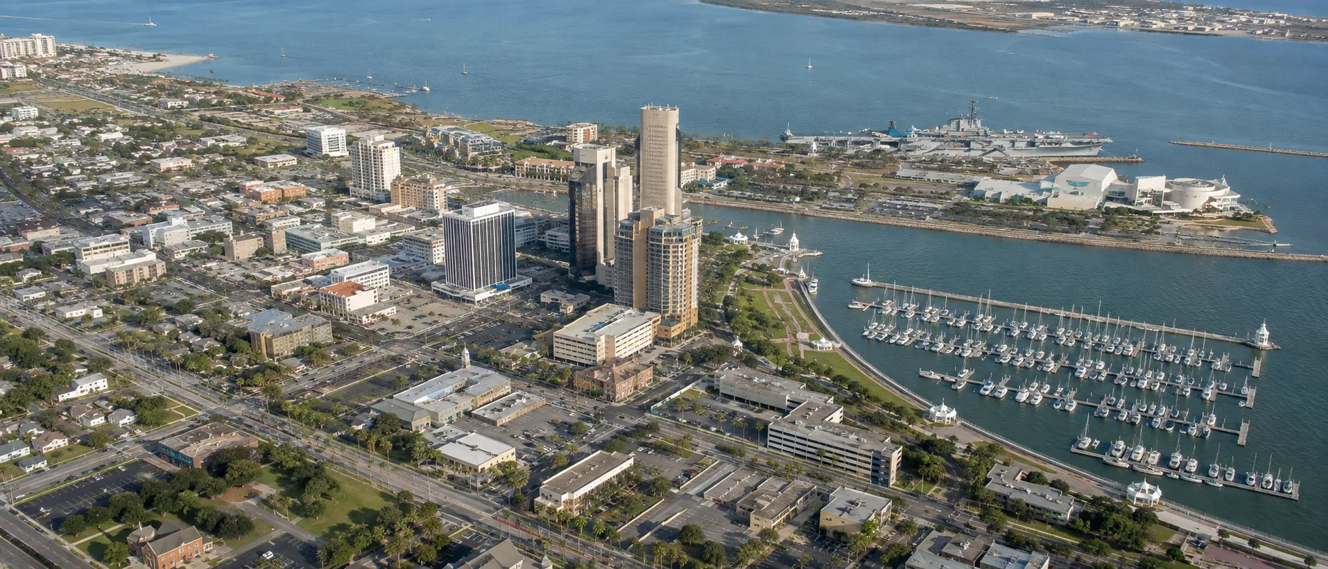 Aerial view of downtown Corpus Christi, TX and the bayfront marina on Corpus Christi Bay