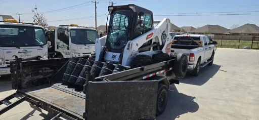 Silt and Erosion Control services equipment, including Bobcat tractor and pickup truck