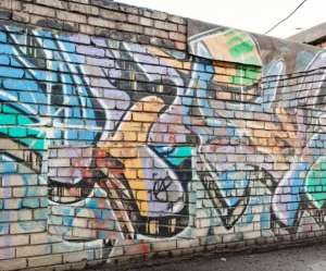 large colorful graffiti on wall